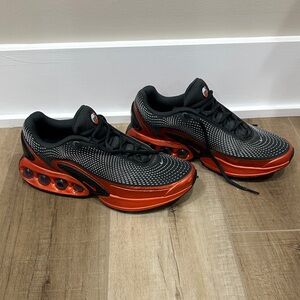 Dynamic Black and Red Athletic Sneakers